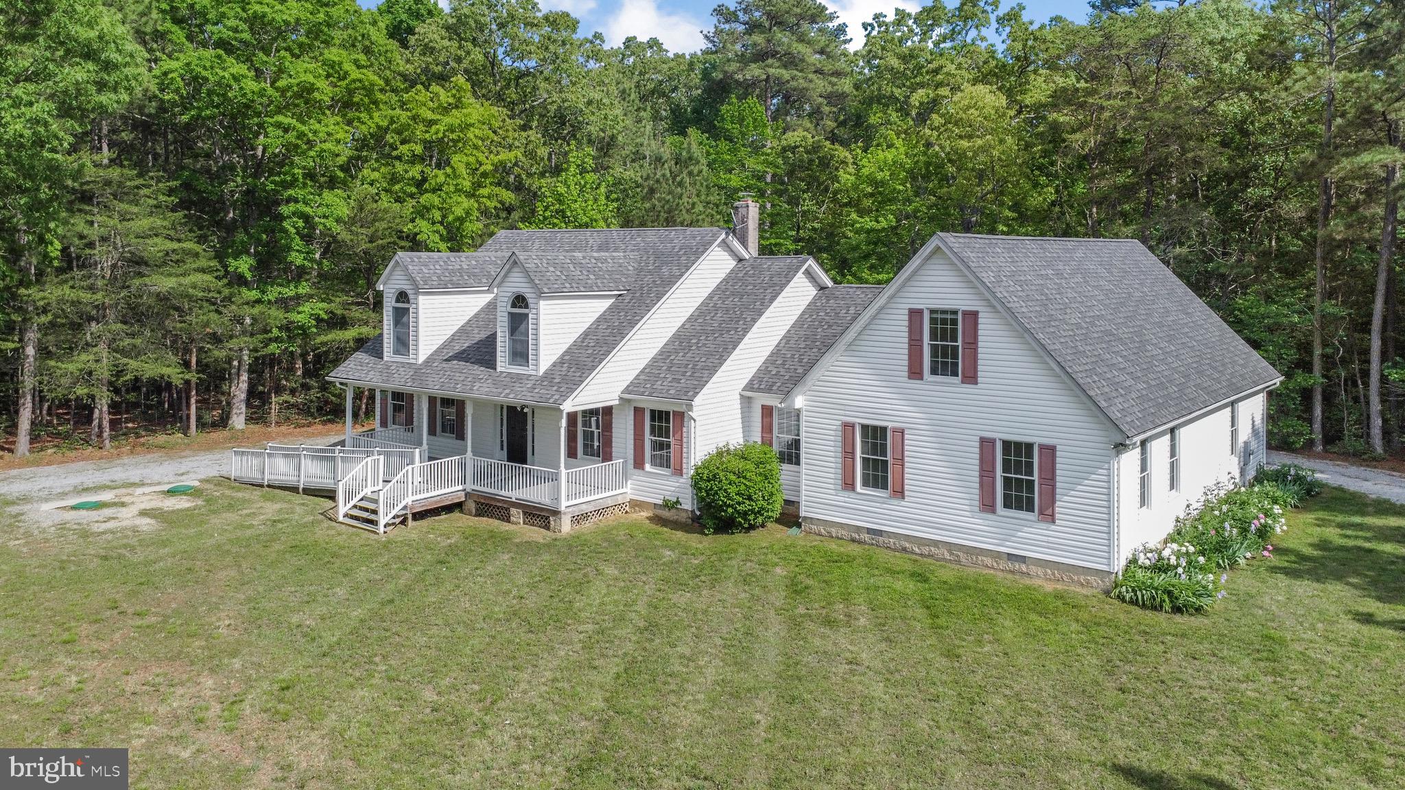 21549 Point Lookout Road Callaway, MD 20620 - Photo 2 of 41 a aerial view of a house with swimming pool next to a big yard