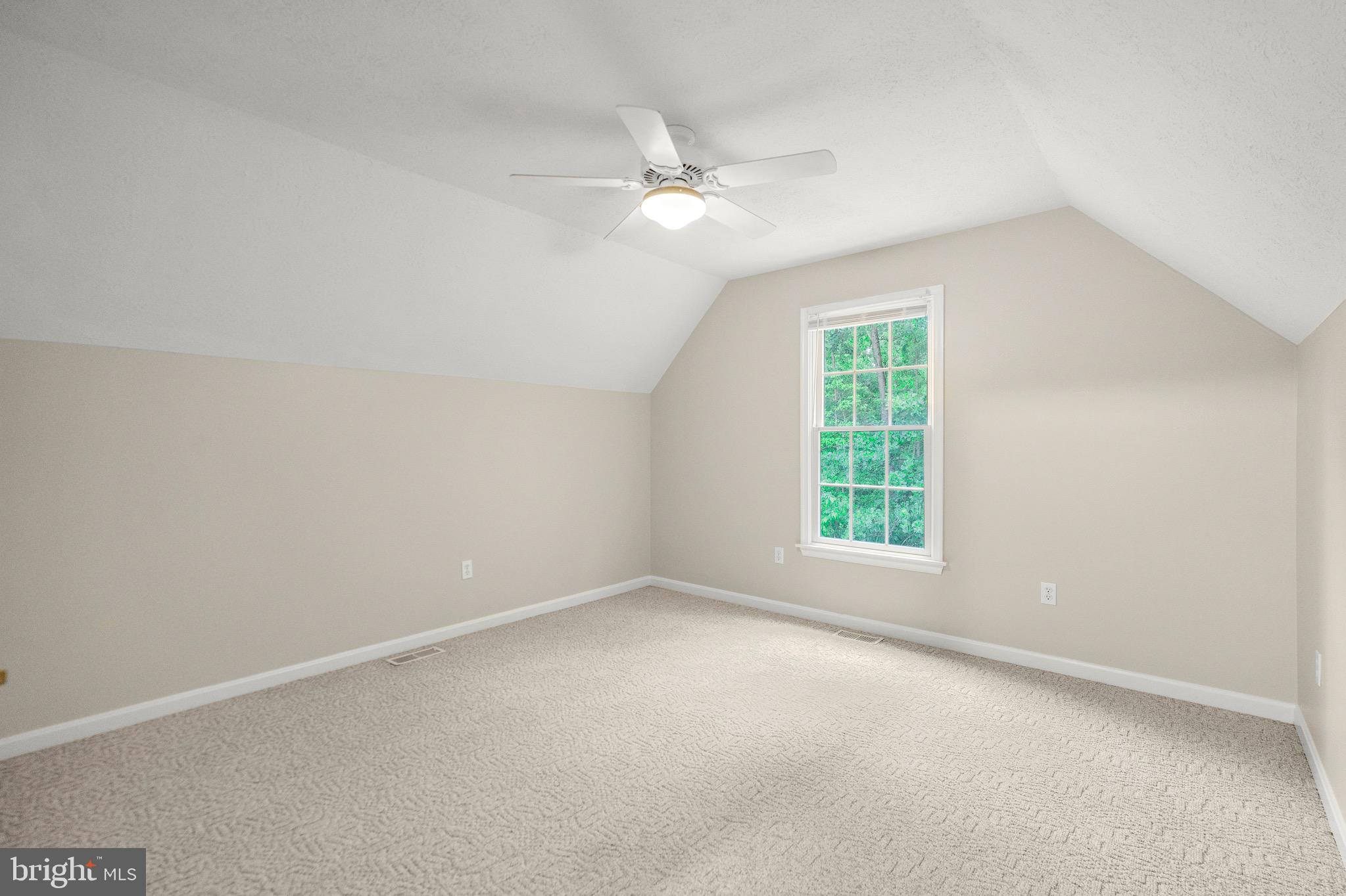 21549 Point Lookout Road Callaway, MD 20620 - Photo 29 of 41 an empty room with a window and a fan