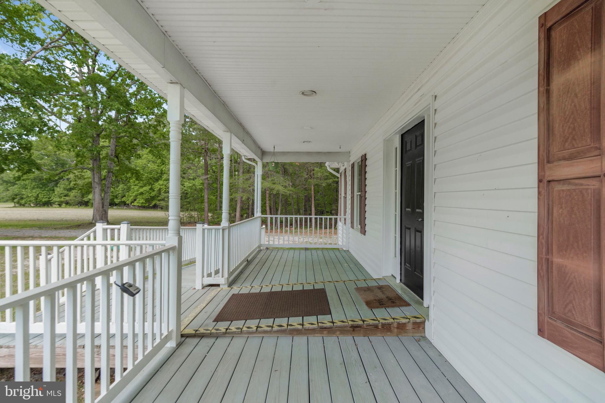 21549 Point Lookout Road Callaway, MD 20620 - Photo 33 of 41 a view of outdoor space with deck