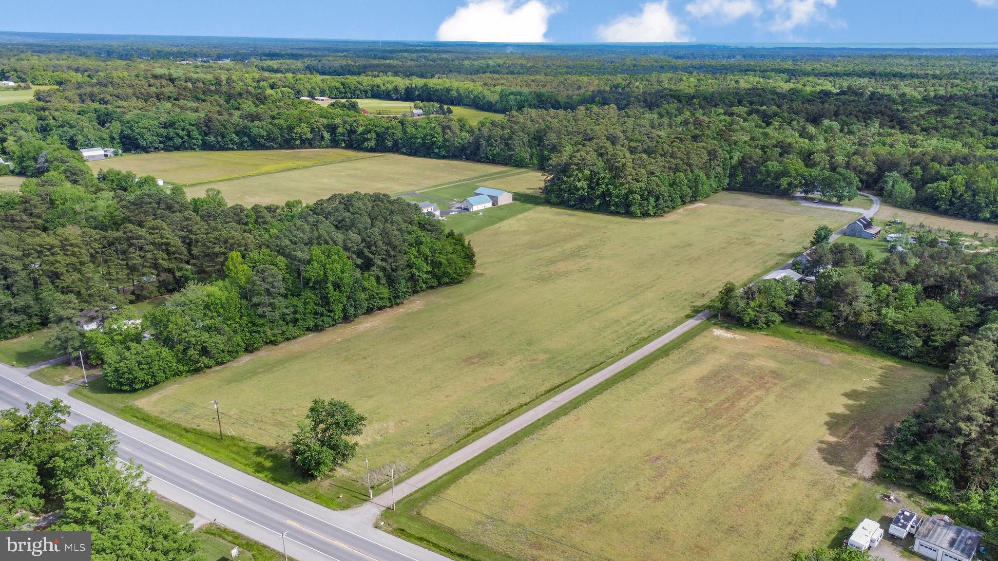 21549 Point Lookout Road Callaway, MD 20620 - Photo 8 of 41 a view of a field with an ocean view
