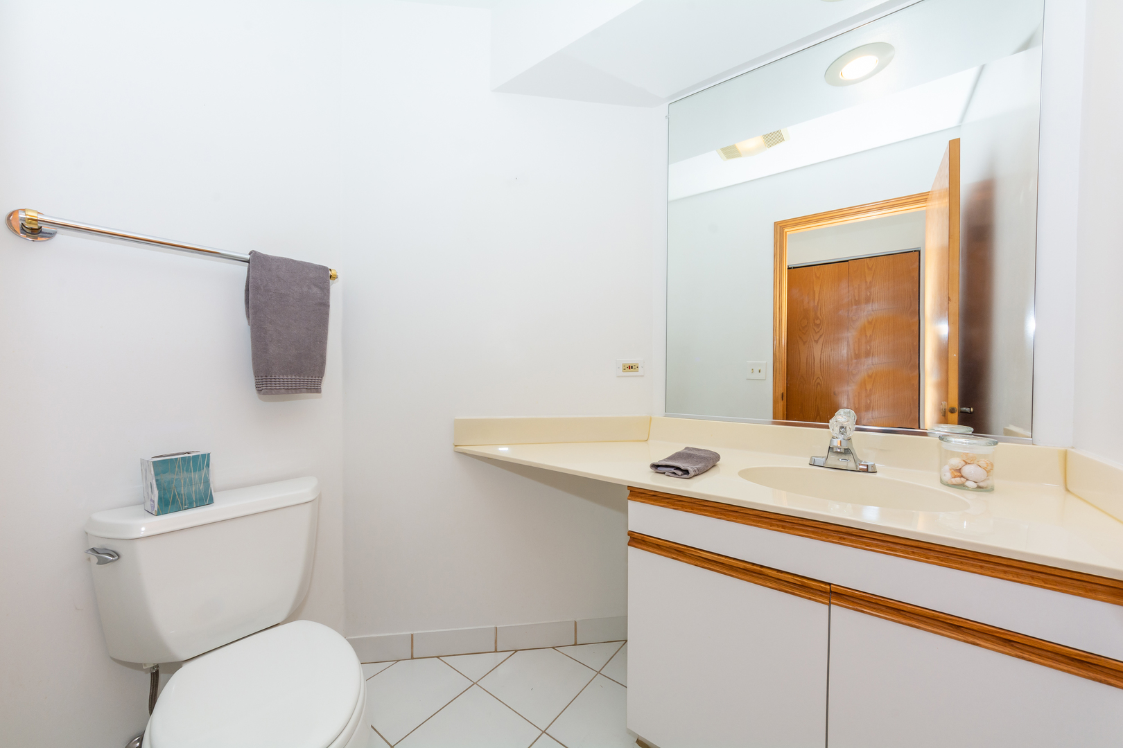 4510 Deer Trail Northbrook, IL 60062 - Photo 19 of 44 a bathroom with a toilet sink and mirror