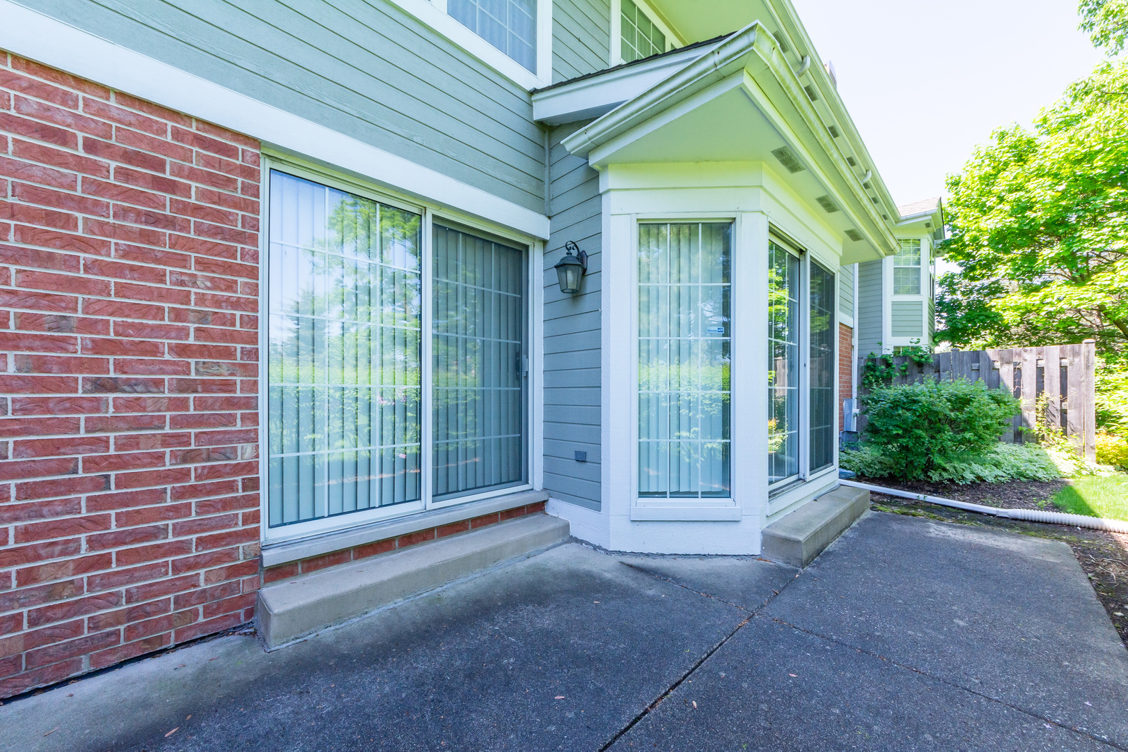 4510 Deer Trail Northbrook, IL 60062 - Photo 38 of 44 a view of a brick house with a large windows