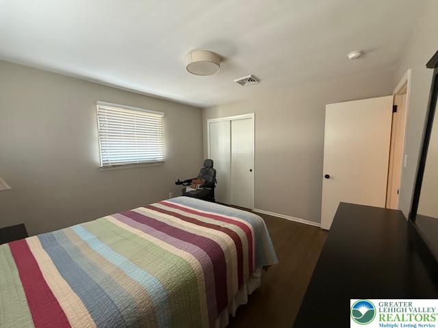 1626 3rd Street Bethlehem, PA 18020 - Photo 12 of 52 a bedroom with a bed and a window