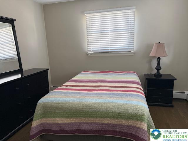 1626 3rd Street Bethlehem, PA 18020 - Photo 13 of 52 a bedroom with a bed and a window