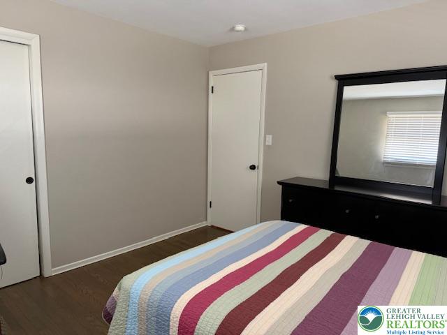 1626 3rd Street Bethlehem, PA 18020 - Photo 14 of 52 a bedroom with a bed and a mirror
