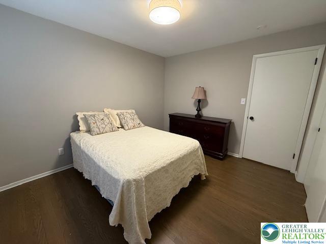1626 3rd Street Bethlehem, PA 18020 - Photo 17 of 52 a bedroom with a bed and a lamp on the table