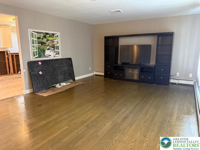 1626 3rd Street Bethlehem, PA 18020 - Photo 24 of 52 a living room with couch and a flat screen tv