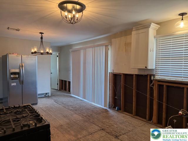 1626 3rd Street Bethlehem, PA 18020 - Photo 25 of 52 a kitchen with stainless steel appliances granite countertop a refrigerator and a stove top oven