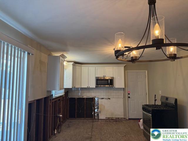 1626 3rd Street Bethlehem, PA 18020 - Photo 30 of 52 a kitchen with stainless steel appliances a sink a counter space and cabinets