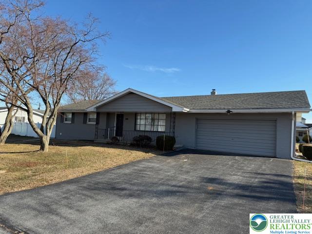 1626 3rd Street Bethlehem, PA 18020 - Photo 46 of 52 a front view of a house with a yard