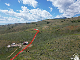 214 Bishop Road, Unit 33 Fish Haven, ID 83287 - Photo 23 of 23 Expansive undeveloped land featuring rolling hills and distant water