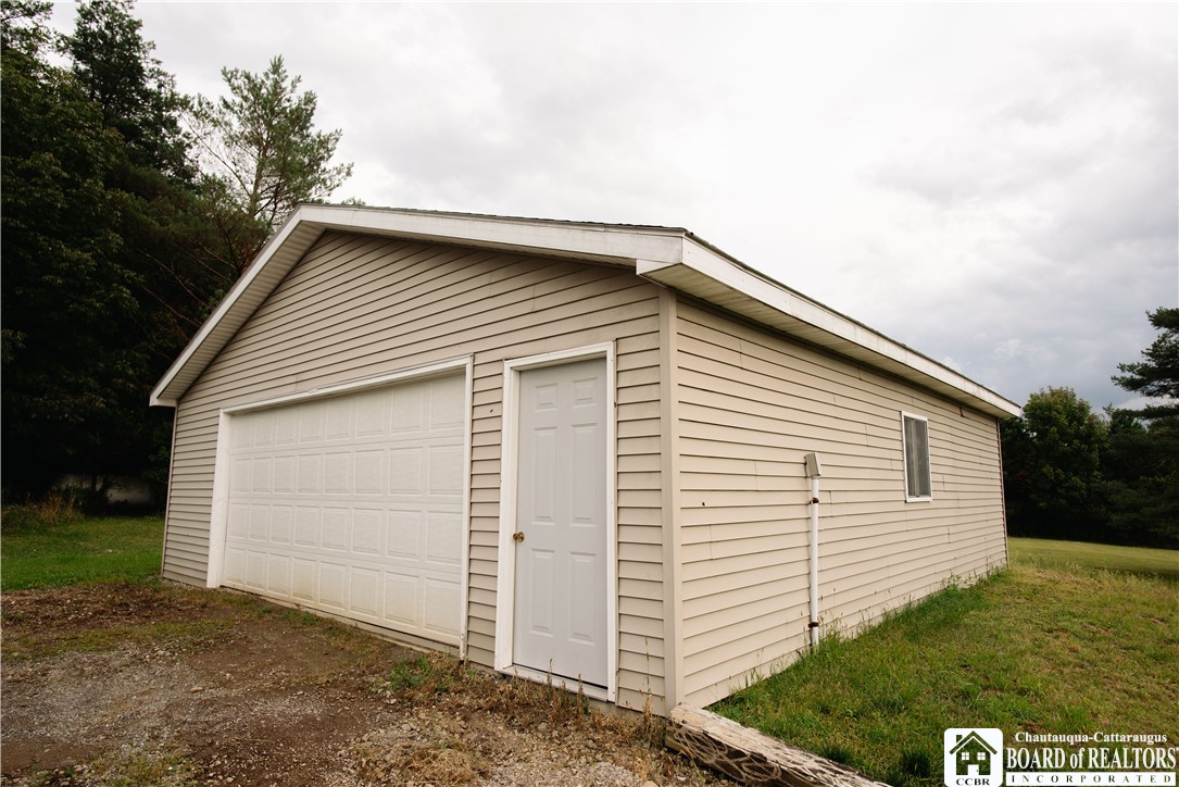 2599 Reynolds Road Farmersville, NY 14737 - Photo 13 of 44 Front side of garage