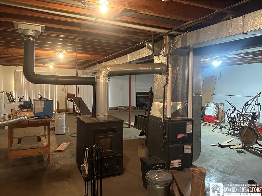 2599 Reynolds Road Farmersville, NY 14737 - Photo 32 of 44 wood stove