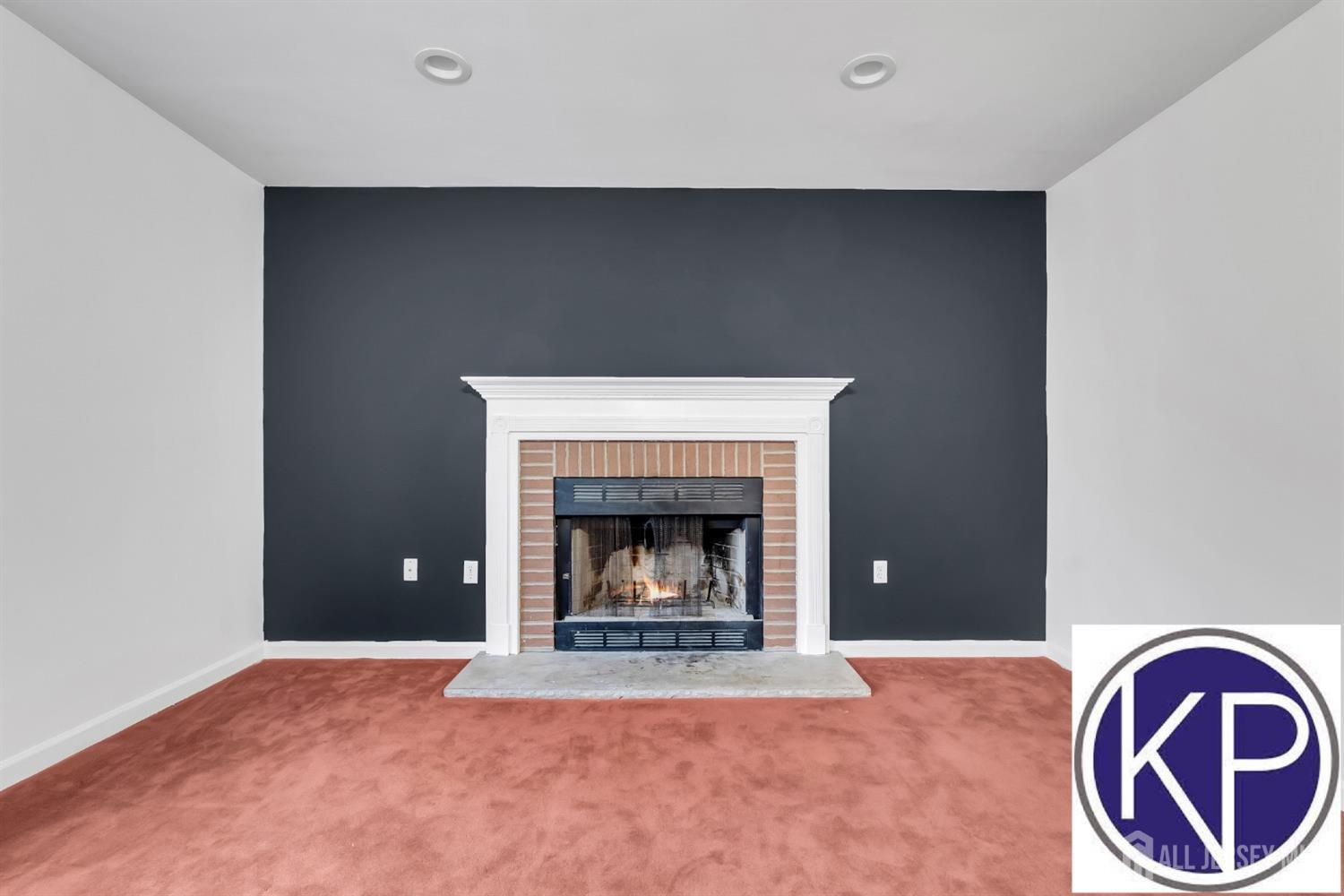 109 Jordan Road Colonia, NJ 07067 - Photo 13 of 30 a view of an empty room with a fireplace