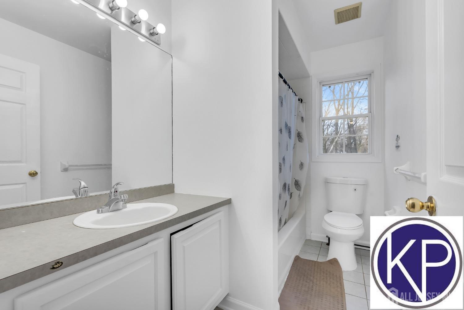 109 Jordan Road Colonia, NJ 07067 - Photo 23 of 30 a bathroom with a sink and a mirror