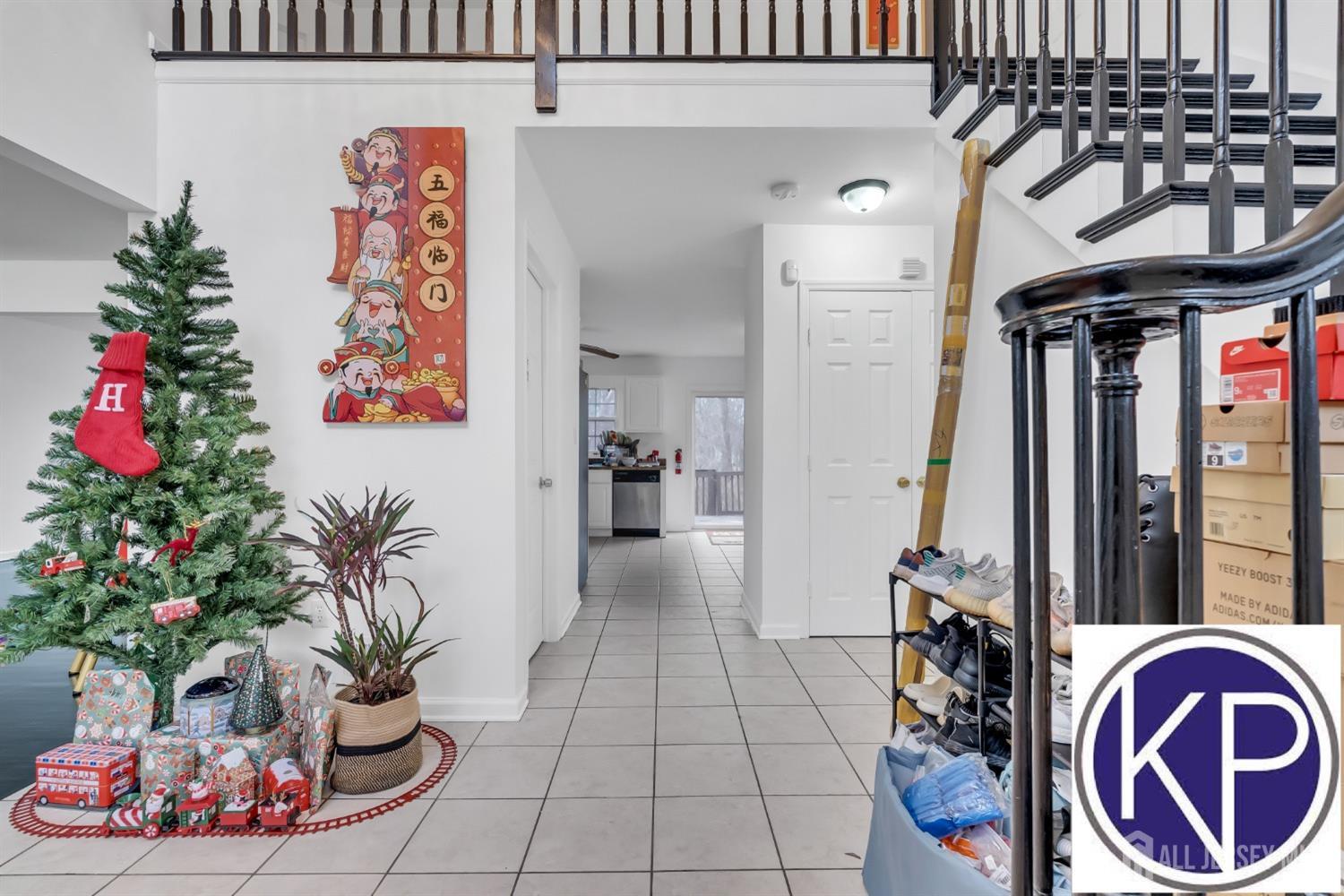 109 Jordan Road Colonia, NJ 07067 - Photo 4 of 30 a view of entryway with a flower pot and a potted plant