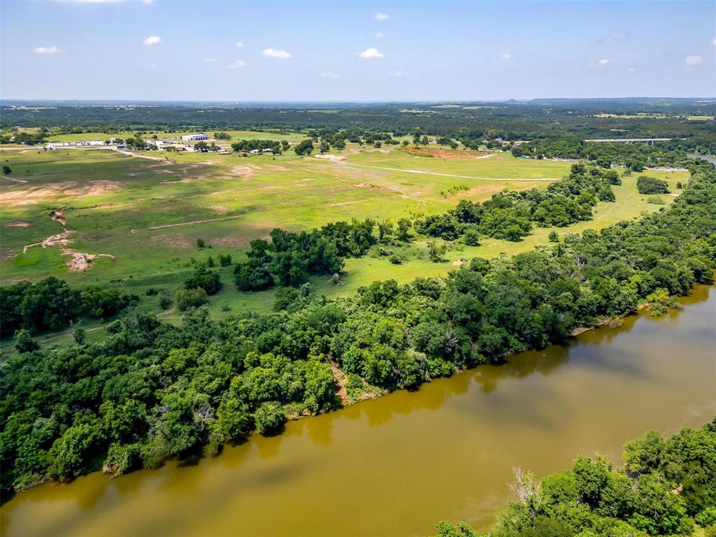 1152 County Road 317 Rainbow, TX 76077 - Photo 6 of 17 a view of a lake with a houses