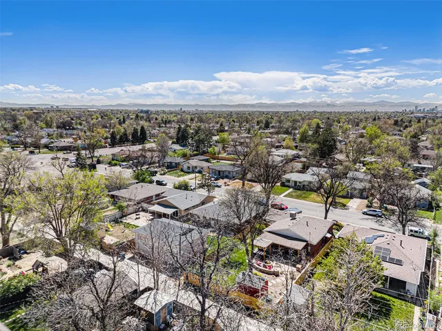 a view of a city with mountains in the background