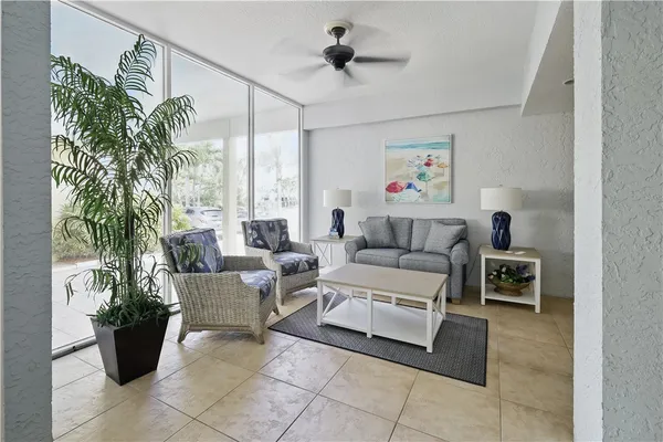 a view of a bedroom with a baby crib