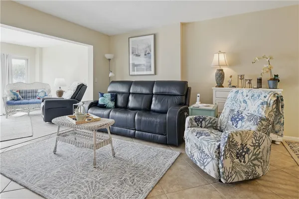 a living room with furniture and a couch