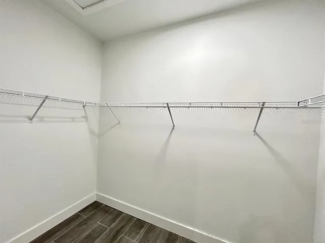 a view of a room with racks on the wall