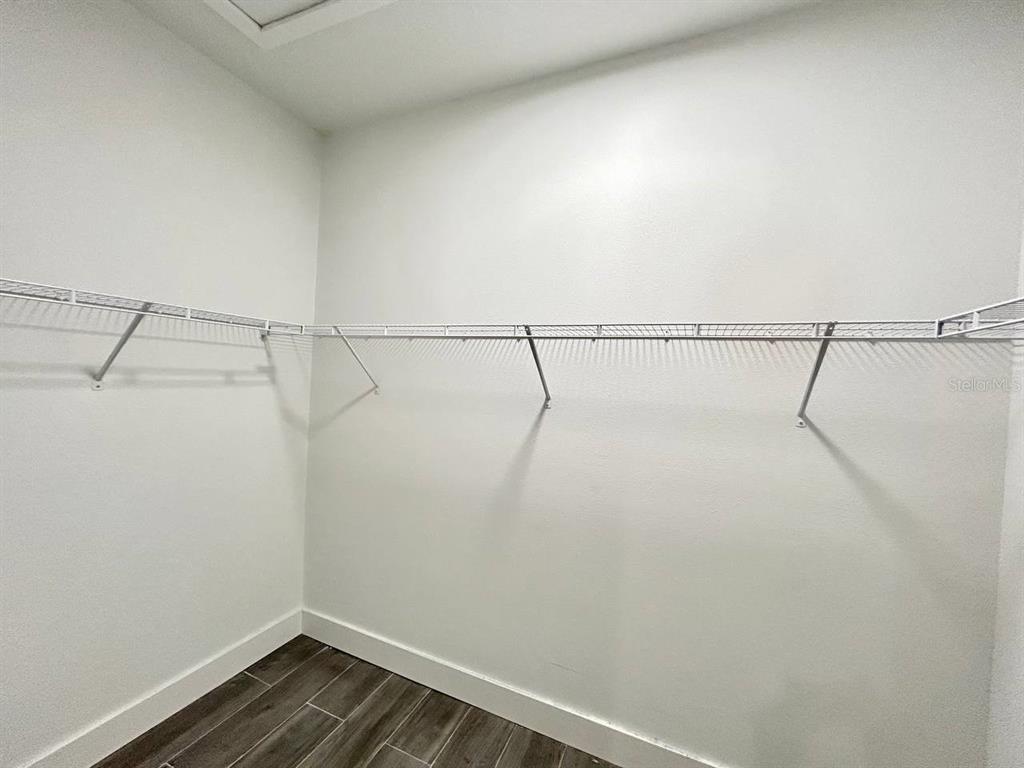 3228 West Beach Street Tampa, FL 33607 - Photo 11 of 22 a view of a room with racks on the wall