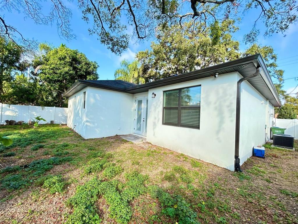 3228 West Beach Street Tampa, FL 33607 - Photo 19 of 22 a house with a yard