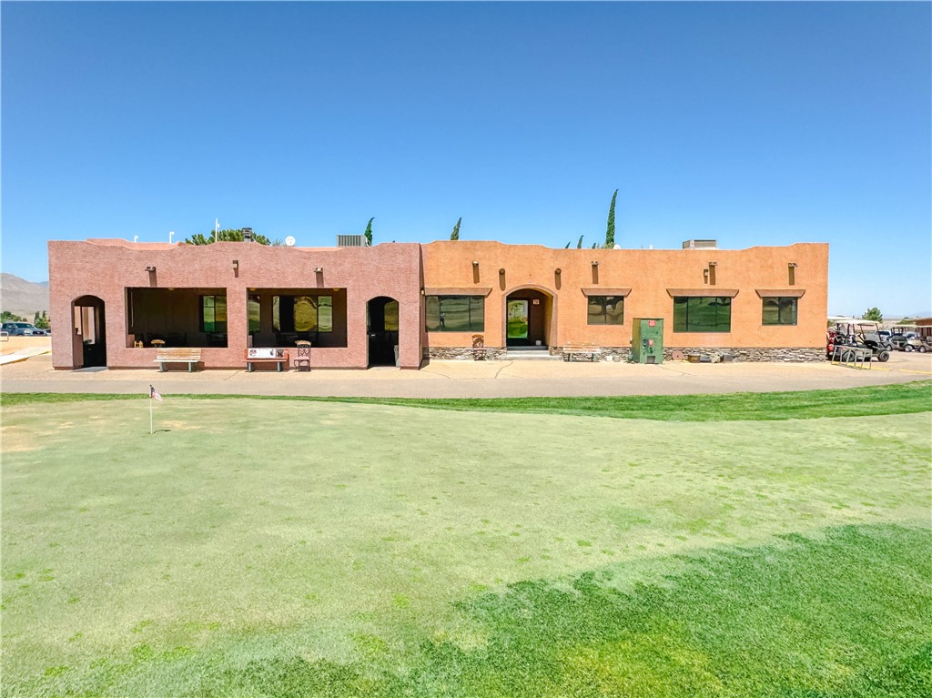 9368 Branded Road Kingman, AZ 86401 - Photo 19 of 32 a large building with huge green field in front of it
