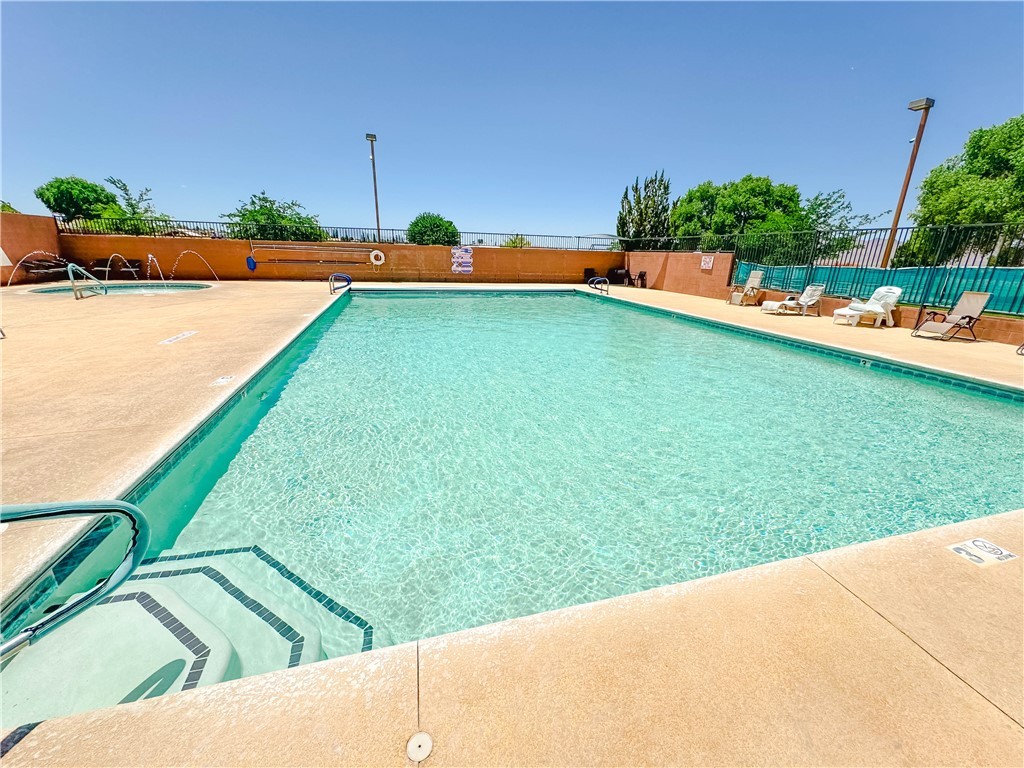 9368 Branded Road Kingman, AZ 86401 - Photo 30 of 32 a view of a swimming pool and a yard