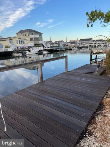a swimming pool view with a lake view