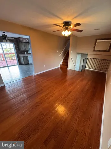 a view of a livingroom with wooden floor