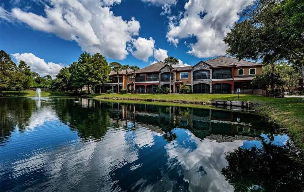 a front view of a house with a lake view