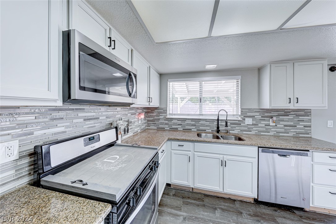 1316 Darlene Way Boulder City, NV 89005 - Photo 12 of 30 Stainless steel appliances and granite countertops