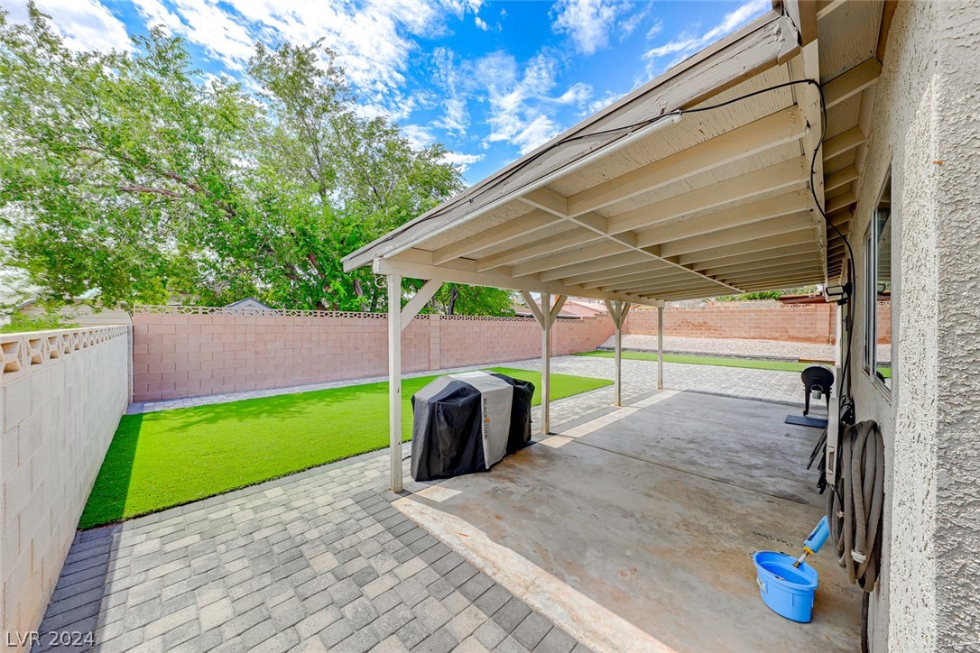 1316 Darlene Way Boulder City, NV 89005 - Photo 26 of 30 Beautifully paved backyard with covered patio w/ m
