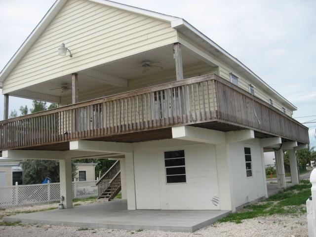 109 Grassy Road Key Largo, FL 33037 - Photo 8 of 11 wraparound porch