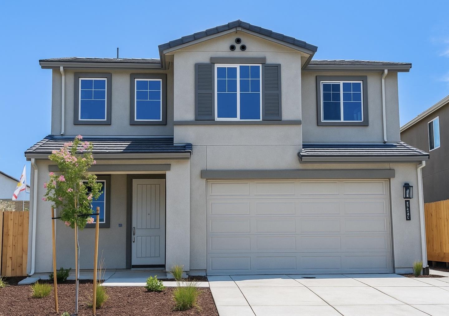 1133 Scout Peak Way Hollister, CA 95023 - Photo 1 of 5 a front view of a house with garden