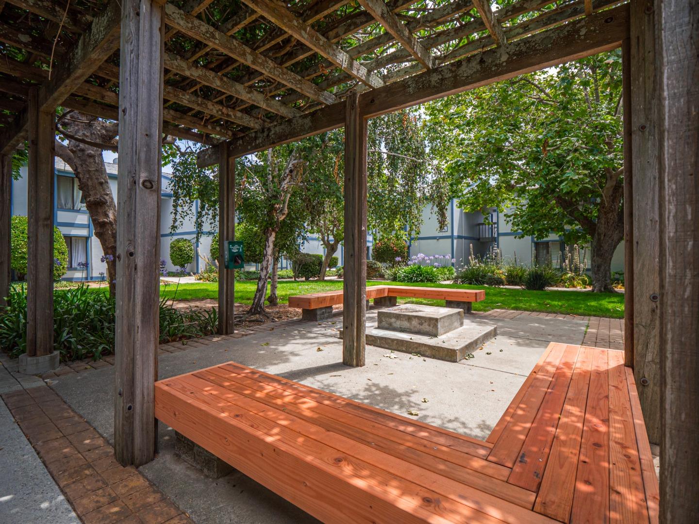 1925 46th Avenue, Unit 71 Capitola, CA 95010 - Photo 28 of 36 a view of a park with sitting area