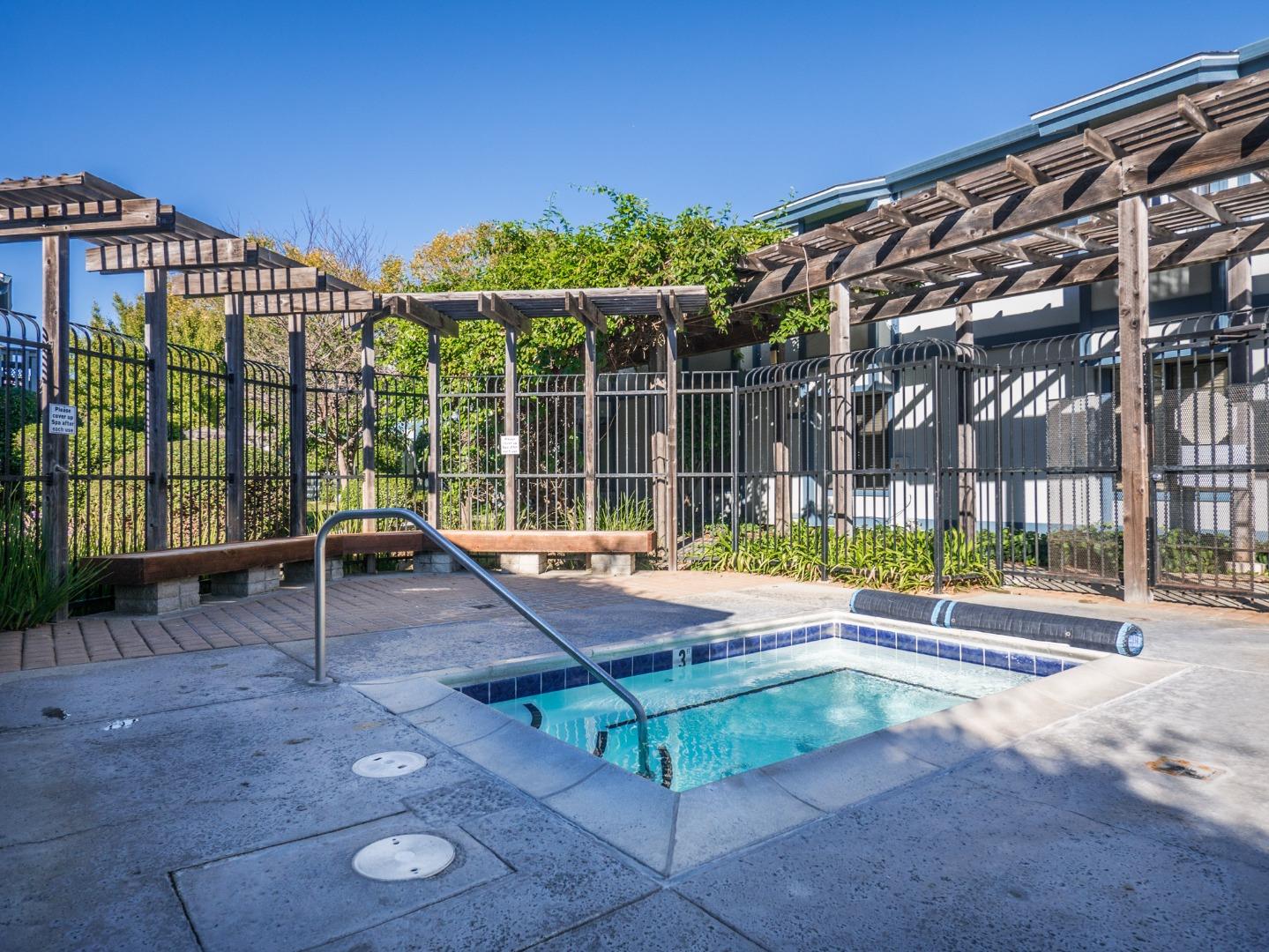 1925 46th Avenue, Unit 71 Capitola, CA 95010 - Photo 36 of 36 a view of a swimming pool with a lounge chair