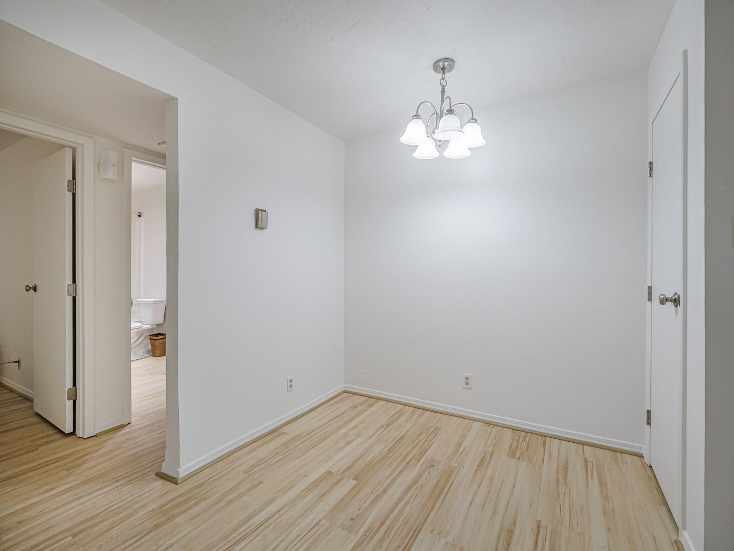 1925 46th Avenue, Unit 71 Capitola, CA 95010 - Photo 10 of 36 a view of empty room with wooden floor
