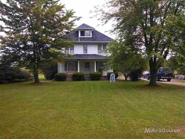 9802 Norman Road Avoca, MI 48006 - Photo 1 of 12 This is a view of the front of the home.