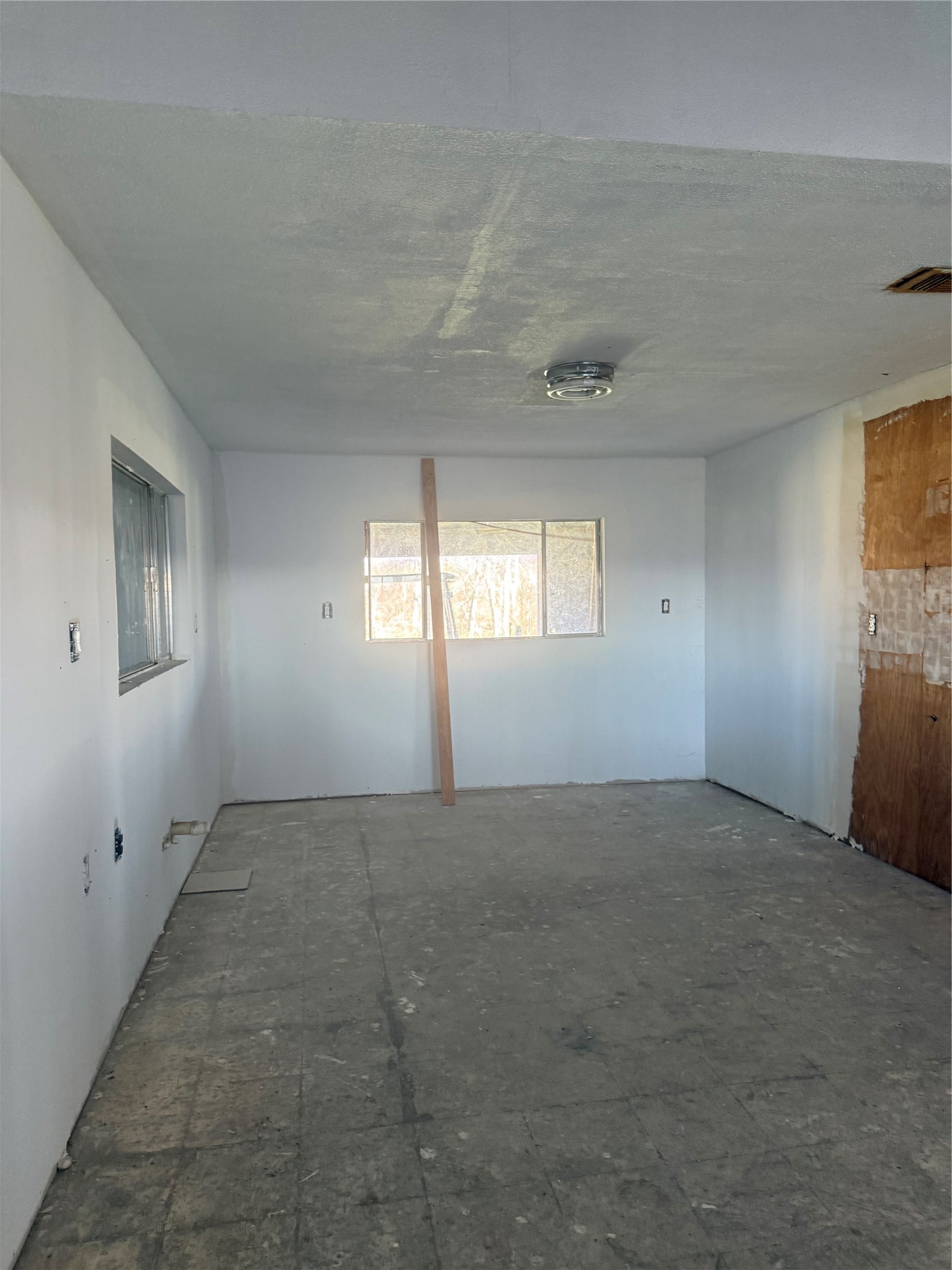 7738 North Farm To Market 331 Road Bellville, TX 77418 - Photo 20 of 41 an empty room with windows