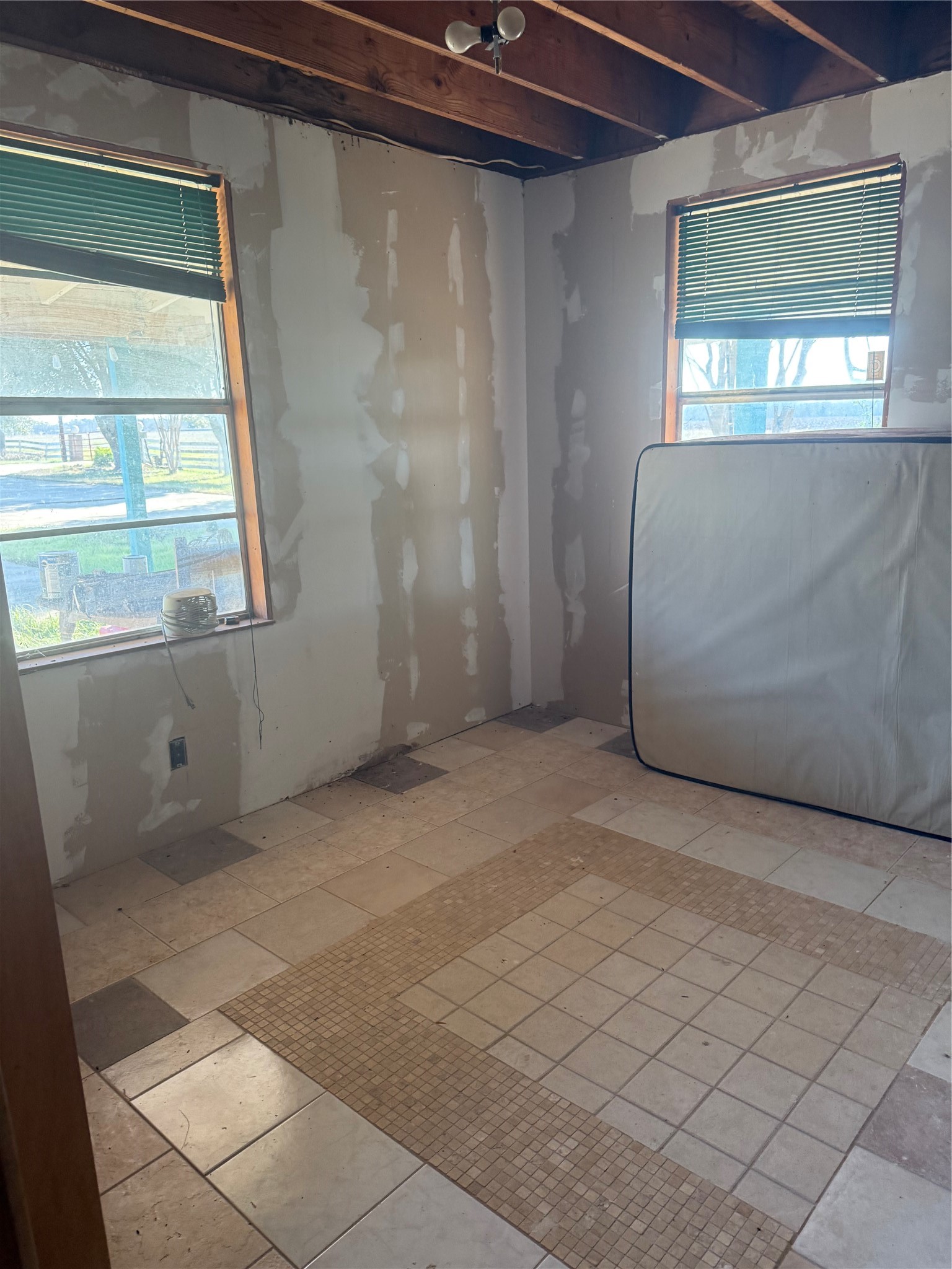 7738 North Farm To Market 331 Road Bellville, TX 77418 - Photo 30 of 41 a view of an empty room with a window