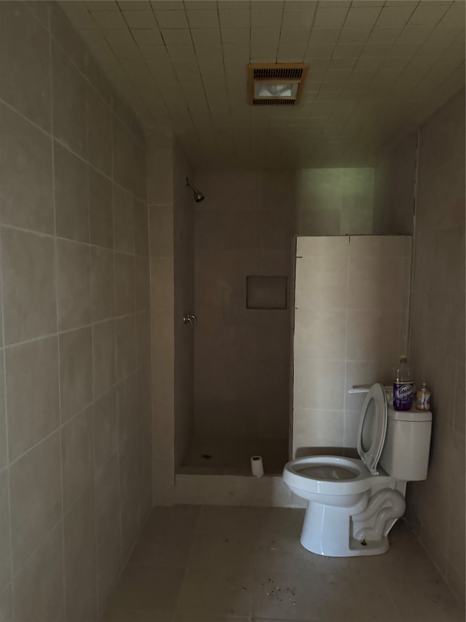 7738 North Farm To Market 331 Road Bellville, TX 77418 - Photo 33 of 41 a white toilet sitting next to a bathroom sink