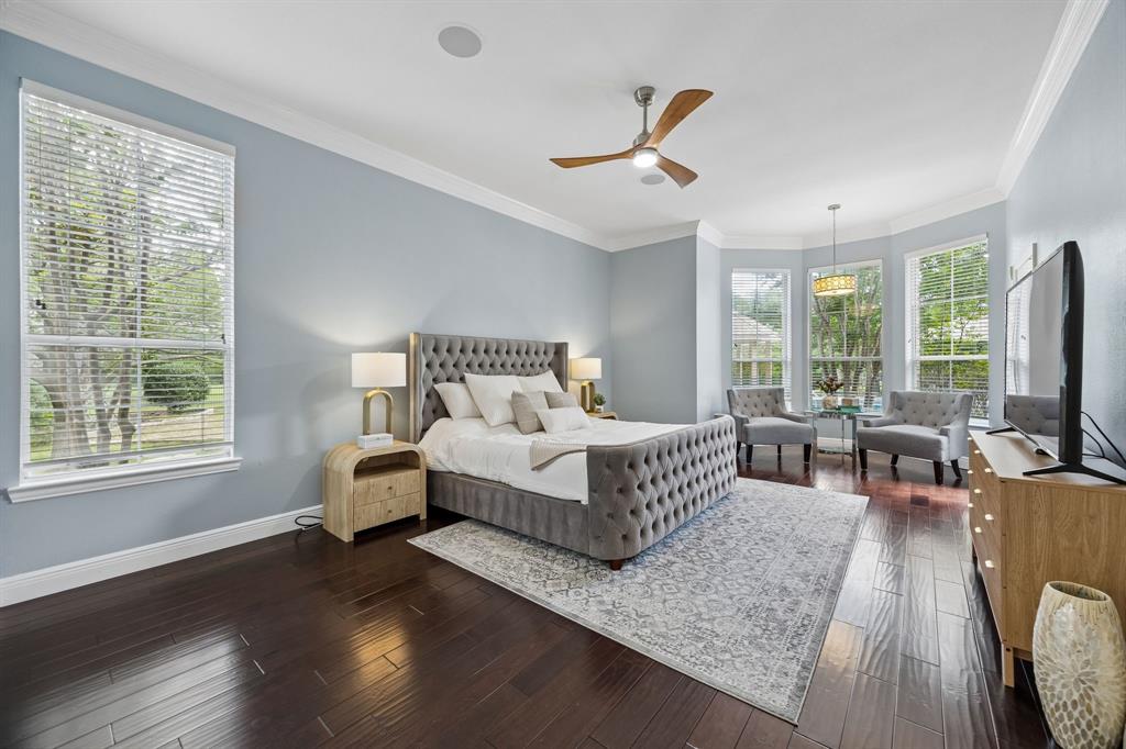 5808 Rathbone Drive Parker, TX 75002 - Photo 19 of 39 The owner's retreat is a true getaway space. The spacious bedroom has bay windows that provide a sitting area, direct access to the pool and a spa-like en suite bathroom.