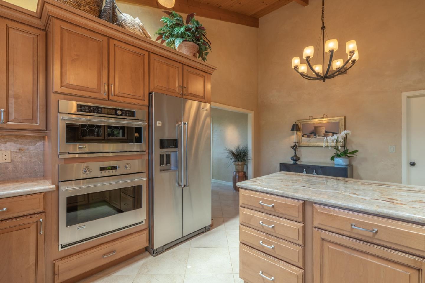 13369 Middle Canyon Road Carmel Valley, CA 93924 - Photo 13 of 45 a kitchen with stainless steel appliances granite countertop a refrigerator and stove