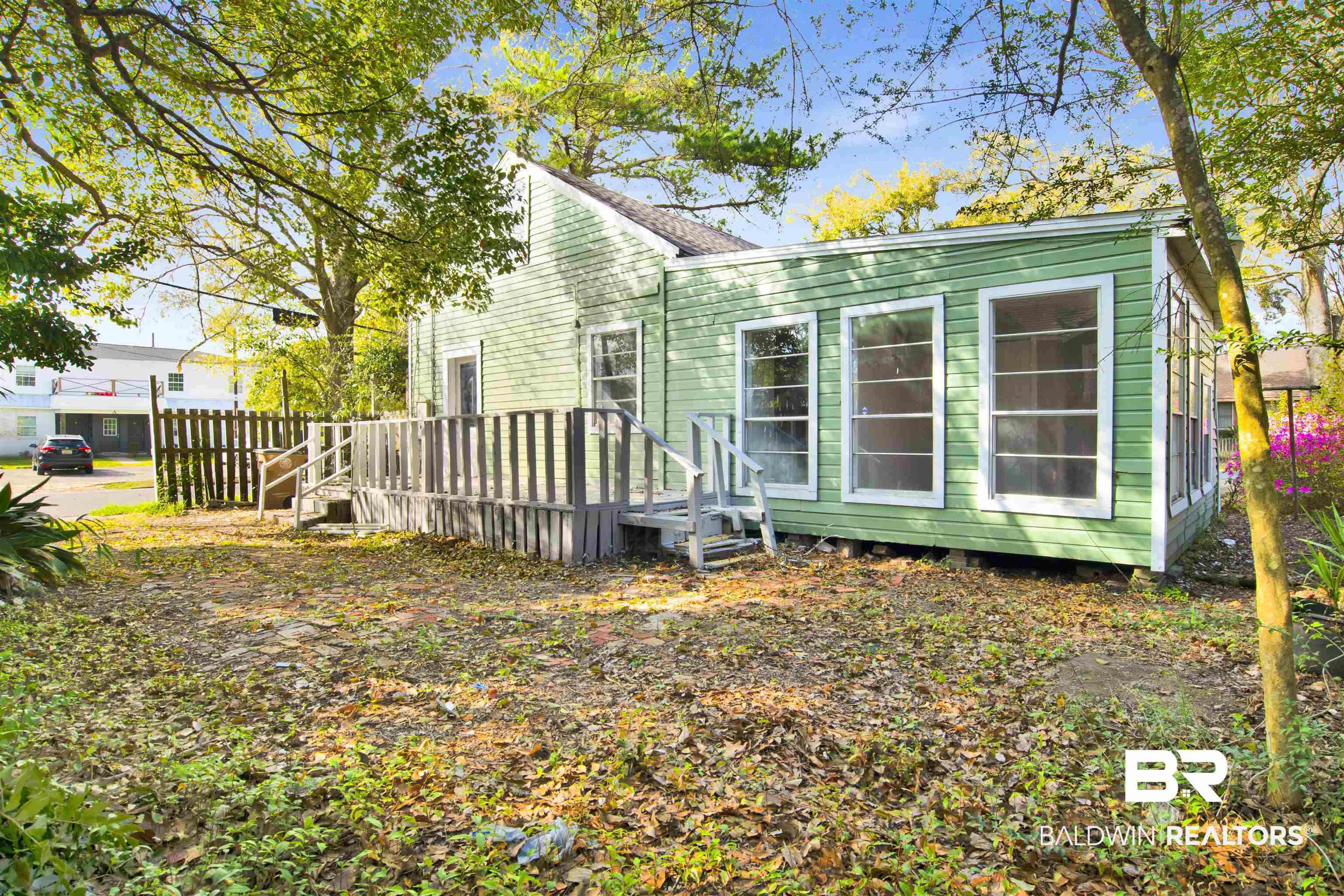 1063 Selma Street Mobile, AL 36604 - Photo 26 of 32 Rear view of house with a deck