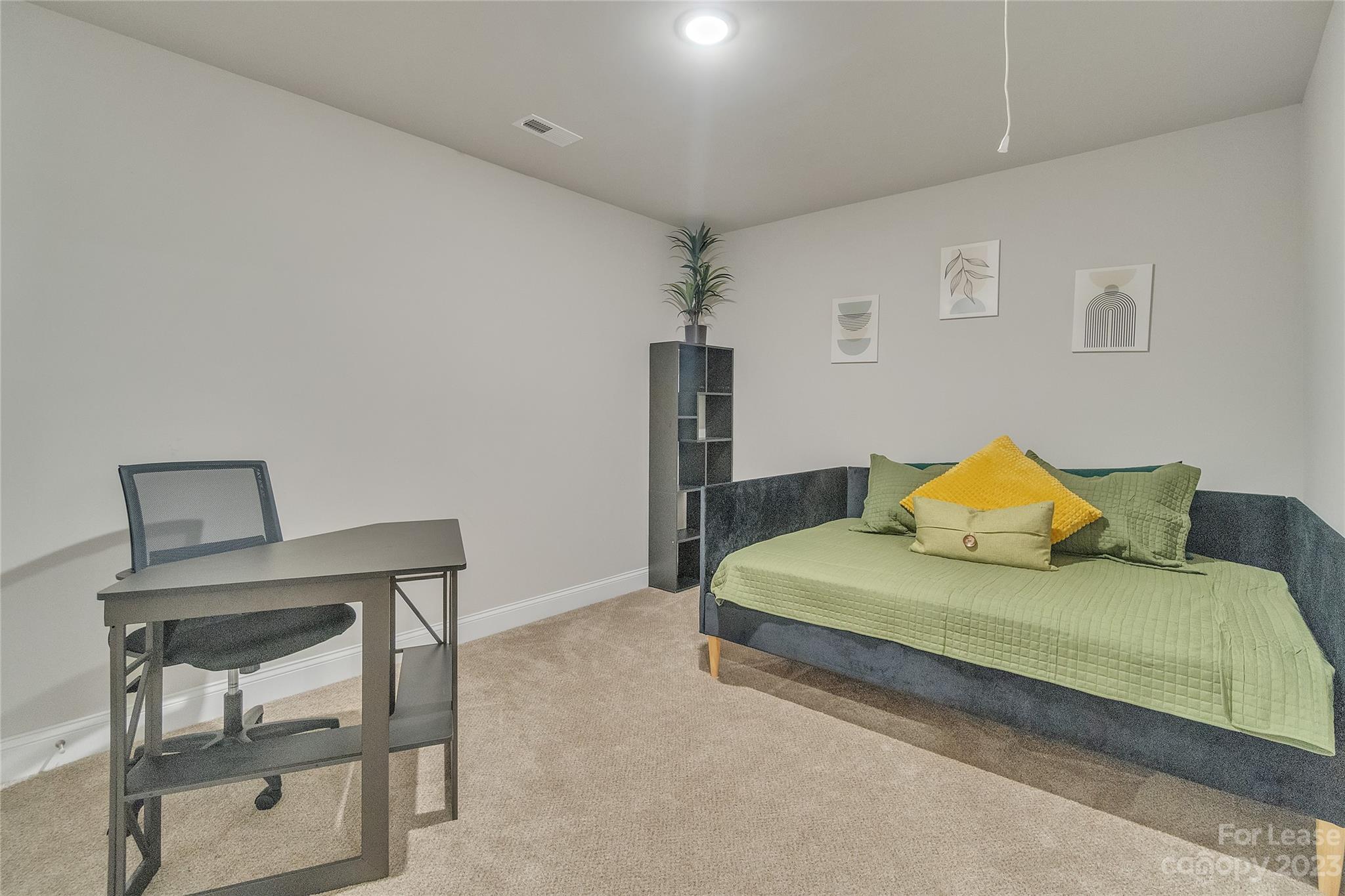 12840 Statesville Road, Unit 15B Huntersville, NC 28078 - Photo 30 of 37 a large bedroom with a bed and furniture
