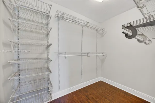 a view of a room with racks on the wall