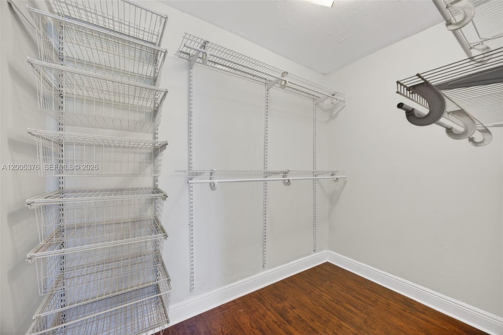 8550 Southwest 109th Avenue, Unit 5217 Miami, FL 33173 - Photo 20 of 34 a view of a room with racks on the wall