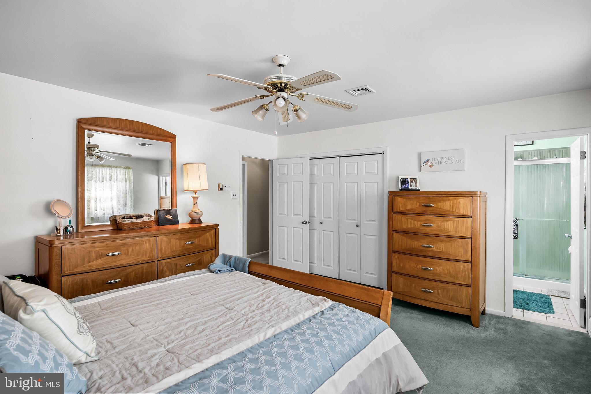 405 New Road Southampton, NJ 08088 - Photo 23 of 39 a bedroom with a bed and a dresser